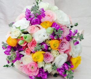 Purple, pink and yellow roses